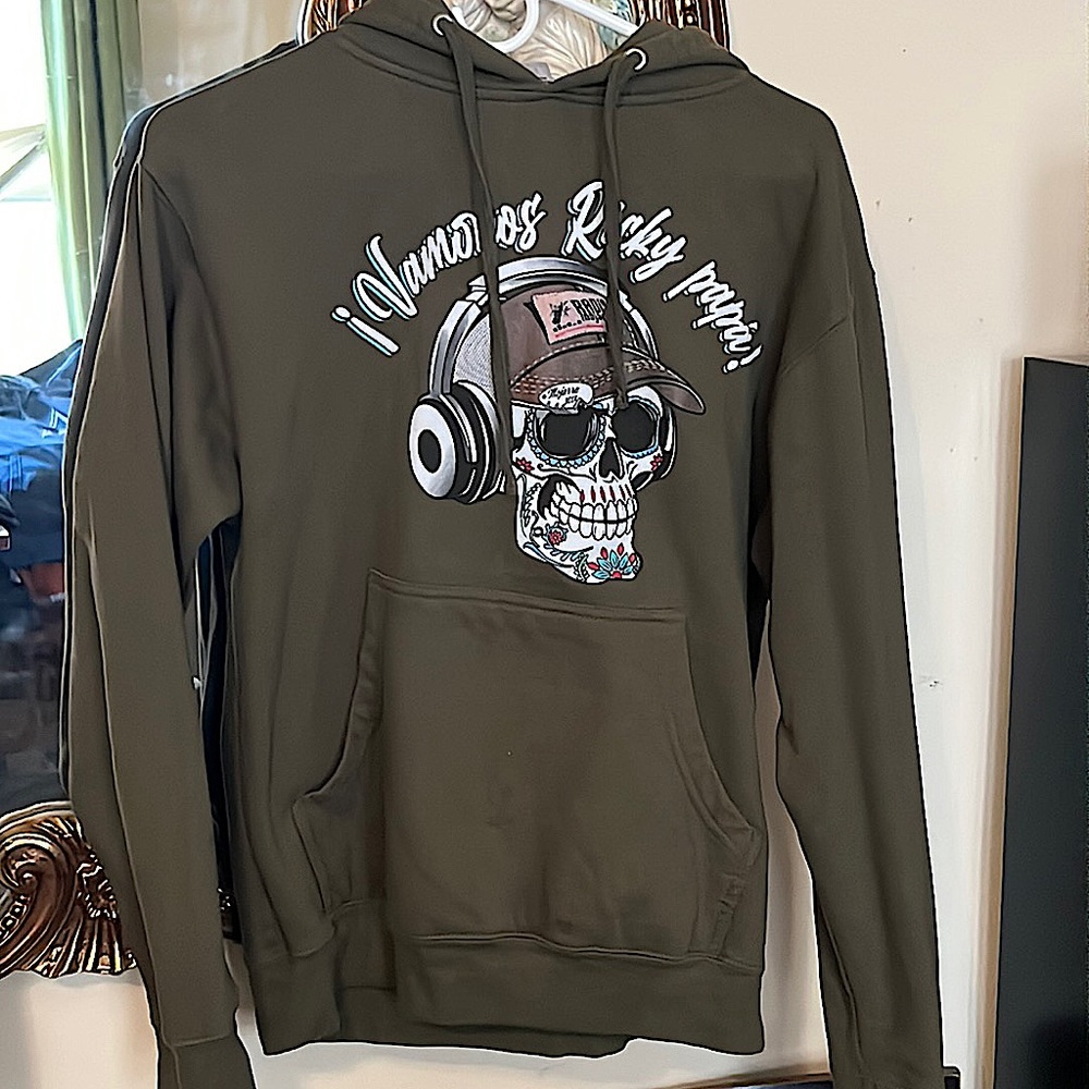 A incredible simple sweater with a one-of-a-kind design in the center!